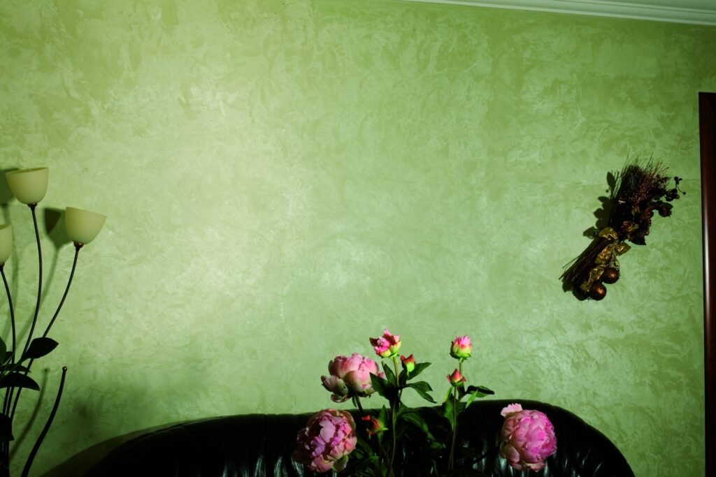 Green velvet plaster finish on feature wall